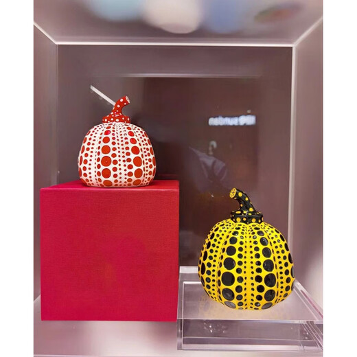 Yayoi Kusama pumpkin ornament sculpture with dense polka dots, yellow skin and black polka dots 10x12cm (not including label)