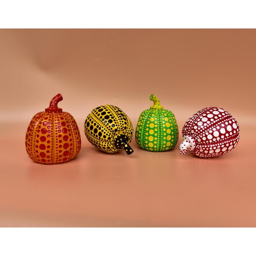 Yayoi Kusama pumpkin ornament sculpture with dense polka dots, yellow skin and black polka dots 10x12cm (not including label)