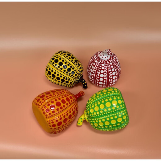 Yayoi Kusama pumpkin ornament sculpture with dense polka dots, yellow skin and black polka dots 10x12cm (not including label)