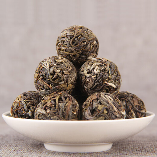 Mu Zhi wholesale raw Pu'er tea leaves ancient tree spring tea dragon ball Yunnan special scraping grade oil small grain raw Pu'ertuo random distribution