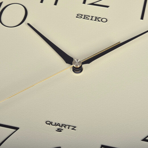 Seiko Japones Japones Seiko Home Punch inútil de 11 pulgadas 28 cm Reloj del dormitorio de la sala de moda moderna QXA695B marco de mármol superficie amarilla