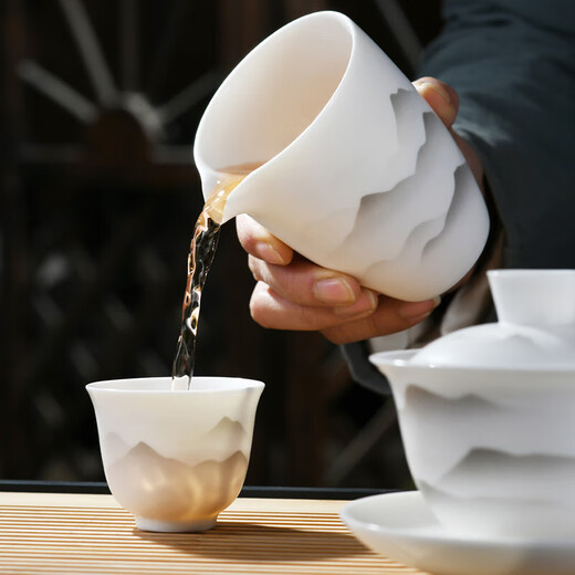 Qixuanyuan mutton fat jade porcelain Kung Fu tea set home high-end office reception guest ink Jiangshan tea cup cover bowl complete set