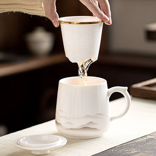 Gold inlaid jade tea cup three-piece set mutton fat jade porcelain household ceramic tea making tea water separation mug gift box Yunzhongyou