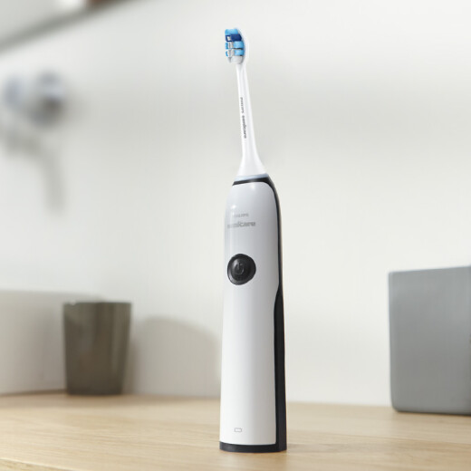 Philips electric toothbrush for adults, fully automatic rechargeable gum care type, comes with 2 brush heads, black and white HX3226/51 (new and old packaging shipped randomly)