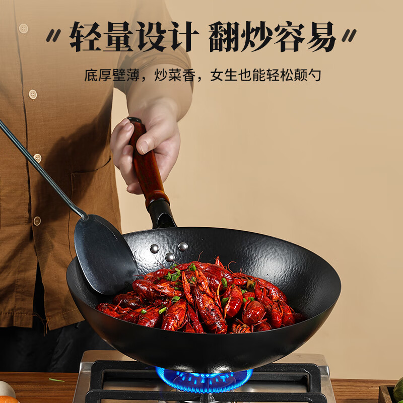 Jincunzhangqiu wok iron pot uncoated household cooking pot round bottom not easy to stick old-fashioned forged wrought iron pot has been opened