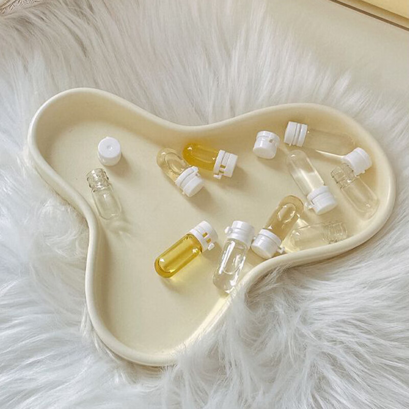 Suican small light bulb refill bottle, daily disposable essential oil bottle, disposable wide-mouth makeup remover glass sample liquid refill empty bottle, portable round bottom bottle 1.5ml, 20 pieces, free storage box