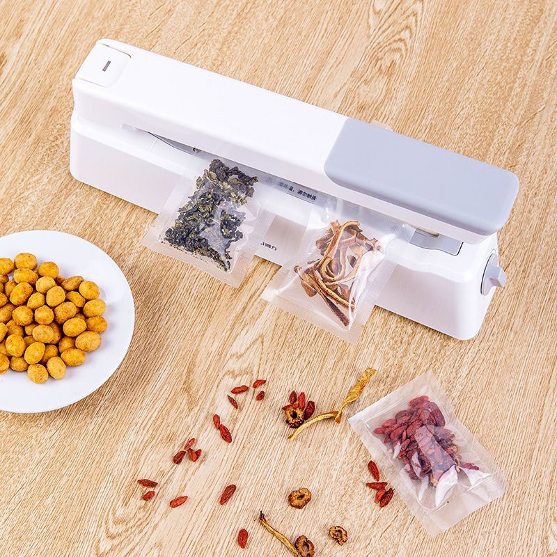 Deli Deli hand pressure sealing machine food preservation sealing machine packaging machine small packaging machine sealing and plastic sealing machine 16499