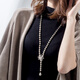 Qlady snowflake imitation pearl sweater chain women's long necklace autumn and winter temperament light luxury niche sweater pendant pendant accessories