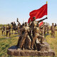 Ao Yanlai customized Red Army sculpture fiberglass cartoon Little Eighth Route Army statue character Long March across the grass relief large Cartoon Little Red Army sculpture Dingjin