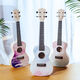 Hochwertige Ukulele-Anfänger, erwachsene weibliche und männliche Internet-Berühmtheit können kleine Gitarre 23-Zoll-Graffiti Purple Paket zwei spielen