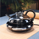 Full Nordic light luxury creative personality Cai Shu teapot heat-resistant glass teapot household electric ceramic stove boiling water tea set Cai Shu teapot (smoke gray)