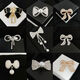 Suiyuxianyan new Hao stone diamond brooch bow tie pin anti-exposure fashion accessories design 5096 (37x57mm)