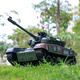 Dwi remote control tank toy remote control car boy and child can fire chariot fire car crawler type can be launched model [spray + water bullet + 2.4G can be played together] Green one rechargeable battery + remote control battery
