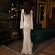 Noliti Bankettkleid Damen 2025 Neues Stil Temperament Langarm jährliche Meeting Gastgeber Langes Fisch Rückgang Luxus Nische High-End-Champagnerfarbe Long XL