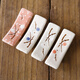 Fantasy chopstick holder creative chopstick holder ceramic snowflake porcelain Japanese chopstick pillow chopstick holder kitchen dual-use hotel table 10 pieces four-color mixed chopstick holder