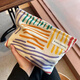 Ins niche canvas bag contrasting color striped cosmetic bag portable travel business trip skin care product storage bag wash bag colorful striped cosmetic bag