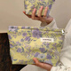 025 new yellow background purple flower niche cosmetic bag portable skin care product collection yellow background purple flower cosmetic bag