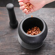Natural black gold stone garlic pounder garlic mortar stone mortar household medicine jar pounder garlic masher baby food supplement grinder black gold stone stone mortar outer diameter 13CM (for wealth)