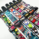 Quyang Gitarrengurt Cartoon Männer und Frauen klassischer Stil personalisierter Volkslied Bakelite Gitarrengurt Ukulele Schultergurt Universal Britische Zeitung Schwanz Nagel + 2 Picks