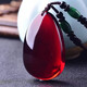 Jinshitong Baltic Sea natural blood amber beeswax Wushi brand water droplet blood amber pendant wine red necklace for men and women B type