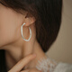 OU Jingsi Light Luxury haut de gamme Boucles d'oreilles de grand cercle Nouveau conception de niche à la mode Loucles d'oreilles irrégulières Tempérament féminin OK-753