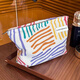 Ins niche canvas bag contrasting color striped cosmetic bag portable travel business trip skin care product storage bag wash bag colorful striped cosmetic bag