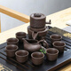 Jingdezhen purple sand stone grinding semi-automatic Kung Fu tea set lazy anti-scalding retro creative time to run ceramic graphite purple sand to success semi-automatic