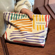 Ins niche canvas bag contrasting color striped cosmetic bag portable travel business trip skin care product storage bag wash bag colorful striped cosmetic bag