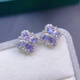 Shilian Japanese and Korean jewelry micro-encrusted natural tanzanite color four-leaf flower small earrings for women's daily versatile silver needles with white gold base