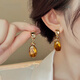 Ji Yuyou Clear Amber Maillard Earrings Women's High-Quality Light Luxurious Temperament Earrings Autumn and Winter Earrings 2025 New Amber