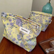 025 new yellow background purple flower niche cosmetic bag portable skin care product collection yellow background purple flower cosmetic bag
