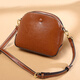 Sac féminin Kuqidishu Niche français 2025 Nouveau sac d'épaule à chute de vache polyvalente sac coquille incliné couleur caramel à la mode petite