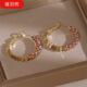 Jinshitong Old Phoenix Gold Store gebrochen silberte rote Diamant -Spleißkreis Ohrringe sinnliche Ohrringe 2024 Neues einzigartiges Temperament gebrochene silberne Ohrringe