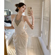 Weiaijiexiaosongshu 2025 spring and summer new French beaded halter neck dress women's dress long skirt famous style waist pack hip fish tail skirt apricot color equal size
