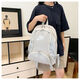 Sports three-painted black leather film shoulder new one-shoulder crossbody bag ins, high school men and women backpack large capacity D698 black