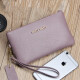 Cool Kangaroo de cuero para mujer billetera de monedas de monedas 2025 Nuevo bolso de cuero suave simple y moderno para teléfono móvil negro
