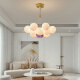 Grand View Garden Wohnzimmer Kronleuchter kreatives Schlafzimmer Leichte Mondblase Hängende Linie Leichter Cartoon Planet Kronleuchter Guangdong Zhongshan Lampe 9734 Golden 13 Head Drei Color Ball 12 cm