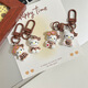
Leopard print cartoon KT keychain brown autumn and winter retro cat school bag pendant ins style sweet cool hanging decoration cute glasses sitting-light leopard print KT