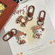 
Leopard print cartoon KT keychain brown autumn and winter retro cat school bag pendant ins style sweet cool hanging decoration cute glasses sitting-light leopard print KT