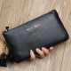 Cool Kangaroo de cuero para mujer billetera de monedas de monedas 2025 Nuevo bolso de cuero suave simple y moderno para teléfono móvil negro