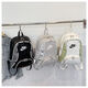 Sports three-painted black leather film shoulder new one-shoulder crossbody bag ins, high school men and women backpack large capacity D698 black