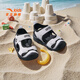 ANTA (ANTA) children's sandals, men's and women's baby shoes, 2026 summer velcro toe-cap anti-collision soft elastic beach shoes, baby toddler shoes, male black/snowflake white 0036-2 26, shoe inner length 16cm