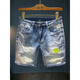 Qianji (Qianji) Rastros pantalones cortos de mezclilla de mezclilla para hombres Pantalones de cinco puntos delgados de cinco puntos