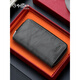 Goldlion (Goldlion) Sac clé de grande capacité simple et à la mode sac en cuir véritable sac en cuir en cuir pratique première couche de bouche de vache sac gris gris