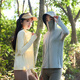 La nueva ropa de protección solar para hombres y mujeres de alta calidad para el verano debajo de la ropa de piel de la pareja de bosques de plátano en todos los lados es ropa extraíble de protección solar en todos los lados del borde del sombrero al aire libre. 9926 Jade White L White L