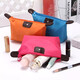 Portable women's supplies cosmetic storage cosmetic bag skin care products storage bag waterproof travel small washing water dumplings 1 pack (random color)
