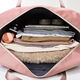 Travel bag large capacity women's super large trolley hand raised poor portable storage bag sports gym bag duffel bag pink 38L