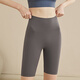 Pantalon de yoga Xueximan à 5 points pour les femmes avec des hanches à taille haute serrage resserrement des fesses de pêche au ventre