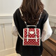 Collège mignon sac à dos 2025 Nouveau style de mode portable portable à pois sac à dos sac à dos sac à bandoulière femmes bac crossbody rouge