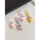 MAAF 9 [9764 people have purchased] Cute cartoon head cover animal girl mobile phone small pendant new style gift accessories hanging decoration best friend accessories bag keychain gasket lanyard Xiaodong [single-piece] Strawberry purple rice rabbit (pendant type)